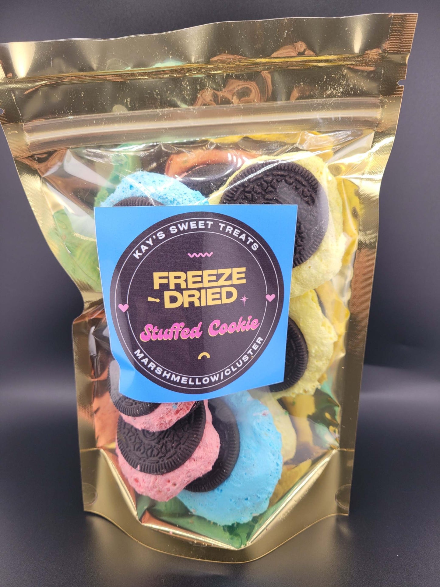 Colorful stuffed cookies with marshmallows and clusters in a gold package.