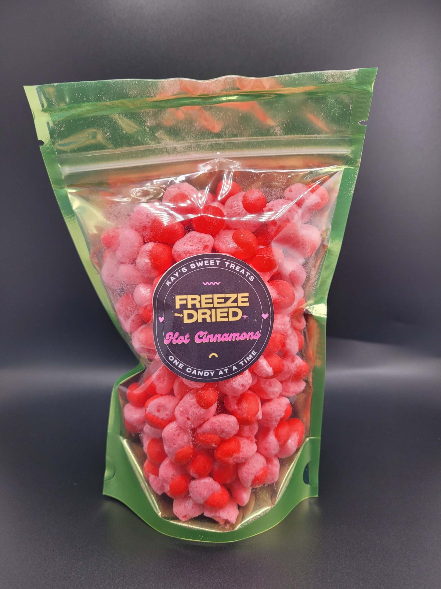 Bag of freeze-dried Hot Cinnamon candies with vibrant red color.